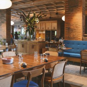 rectangular brown wooden table with chairs set